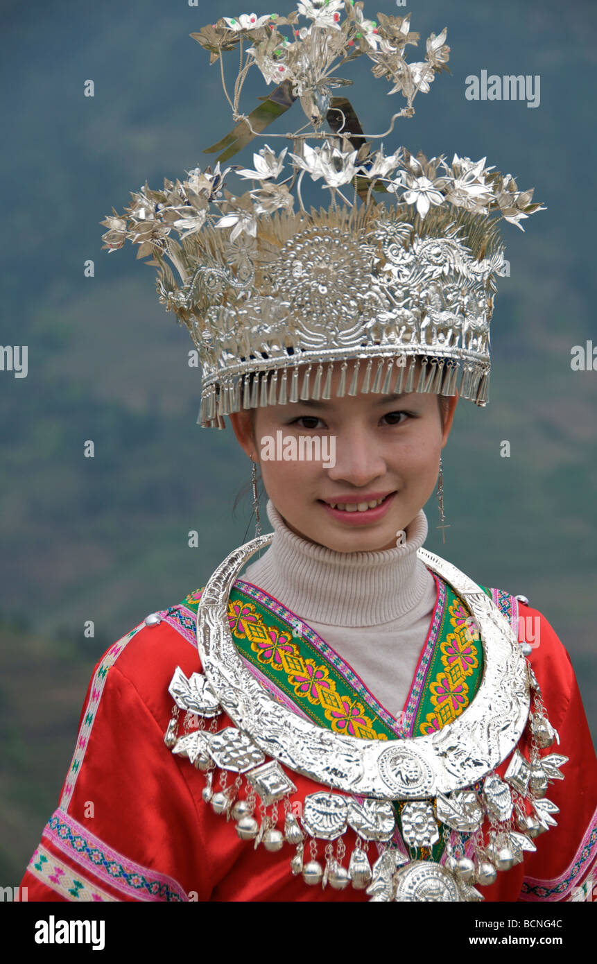 Girl modelling in minority costume Longsheng Guangxi China Stock Photo
