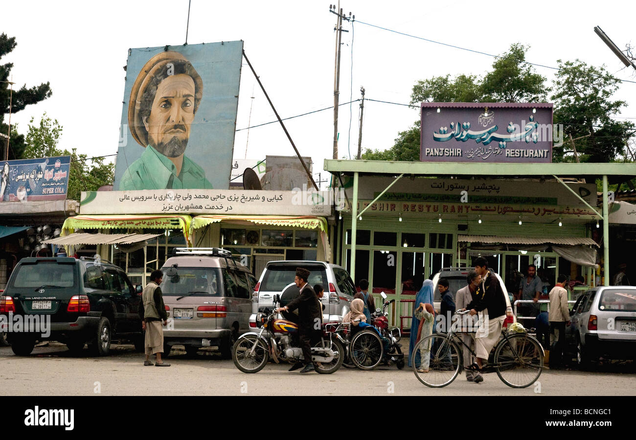 In the busy centre of Charikar town, Afghanistan, is a large portrait of local hero Ahmad Shah Massoud, assassinated in 2001 Stock Photo