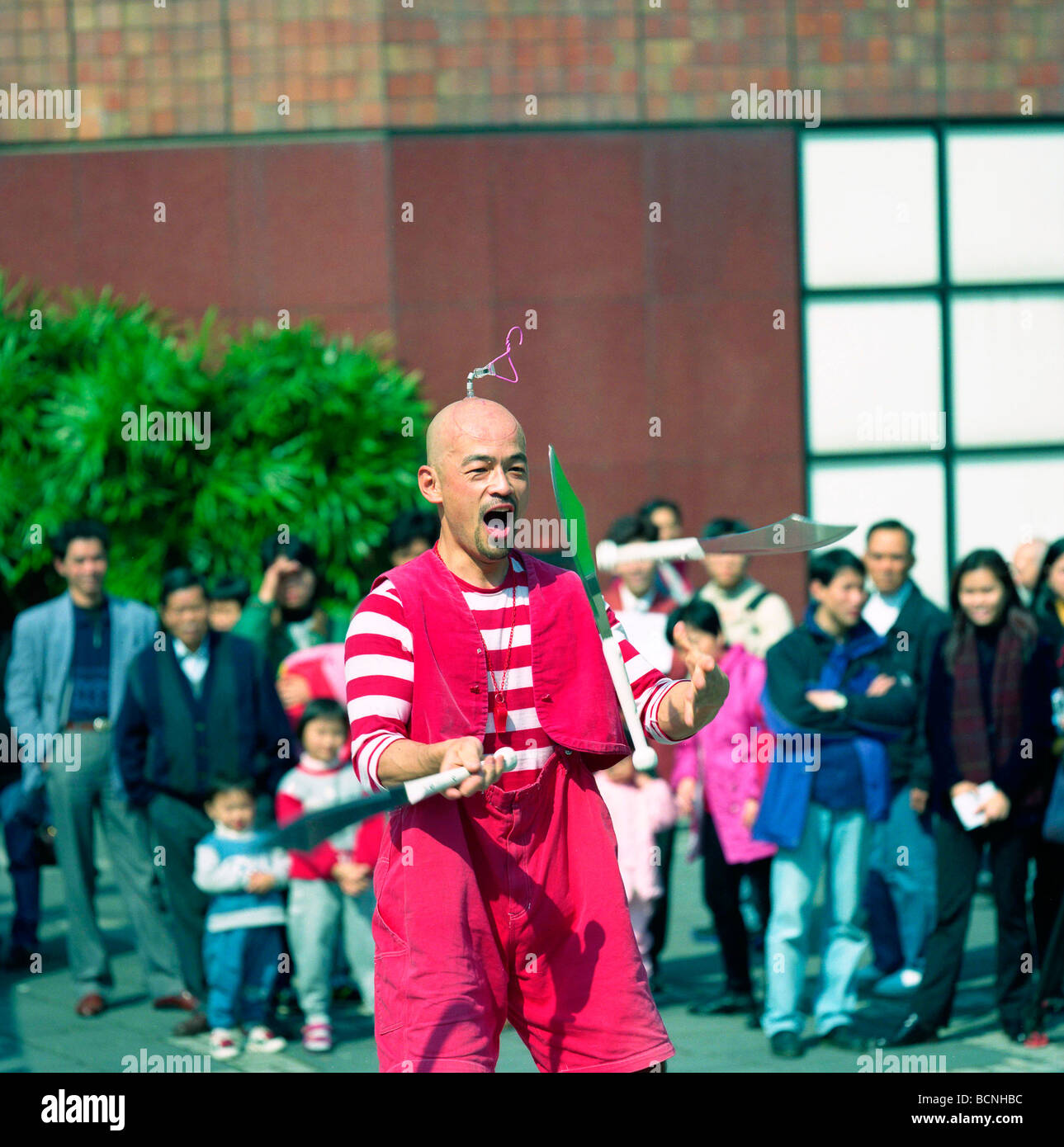 Street performer jogging knives, Hong Kong, China Stock Photo Alamy