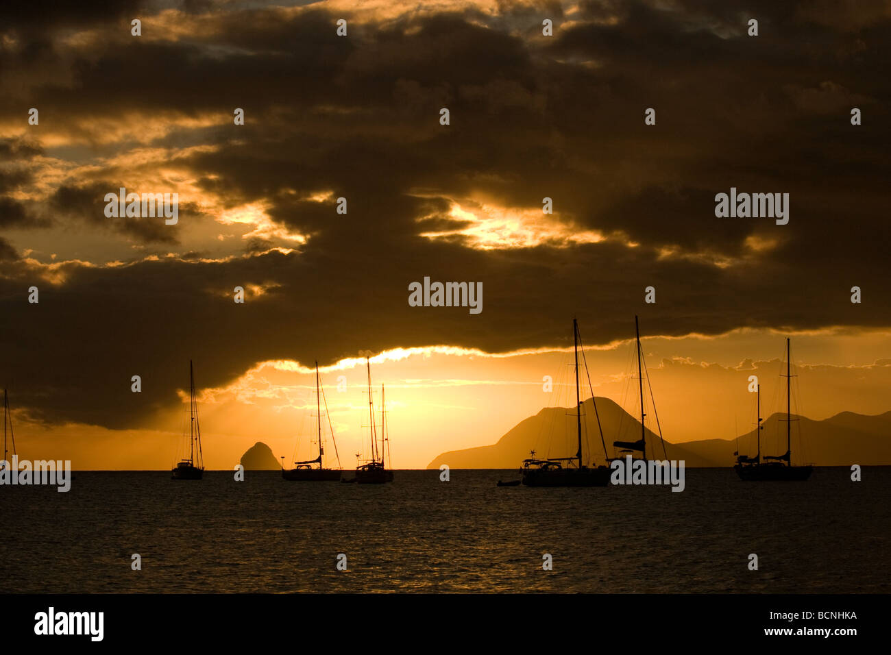 Sunset over sailing boats in Martinique Stock Photo