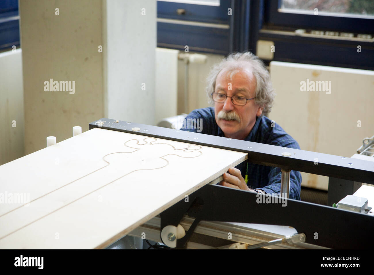 Training for joiners in the school for master craftsmen in the Chamber of Trade CNC milling machine Stock Photo