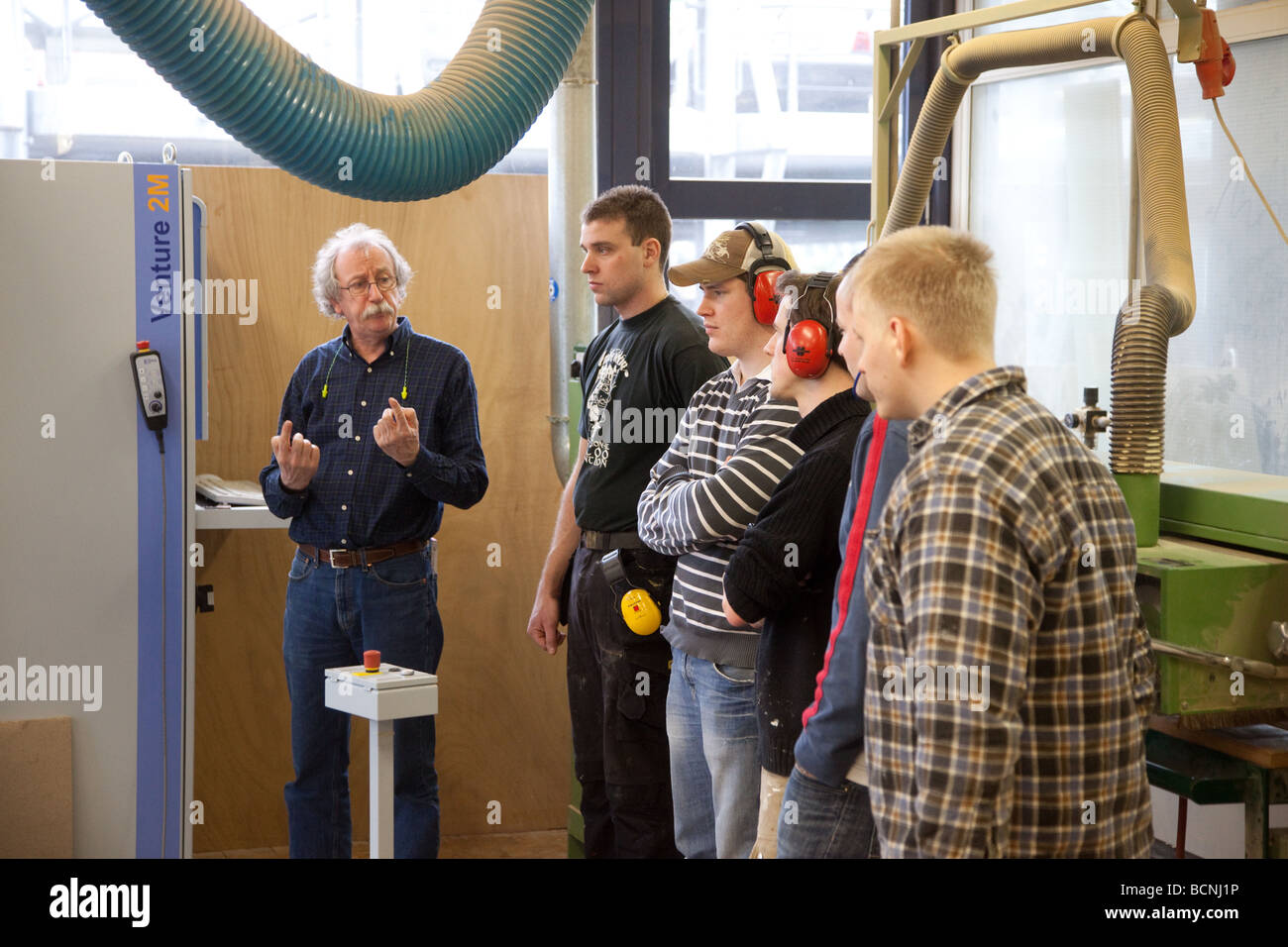 Training for joiners in the school for master craftsmen in the Chamber of Trade CNC milling machine Stock Photo