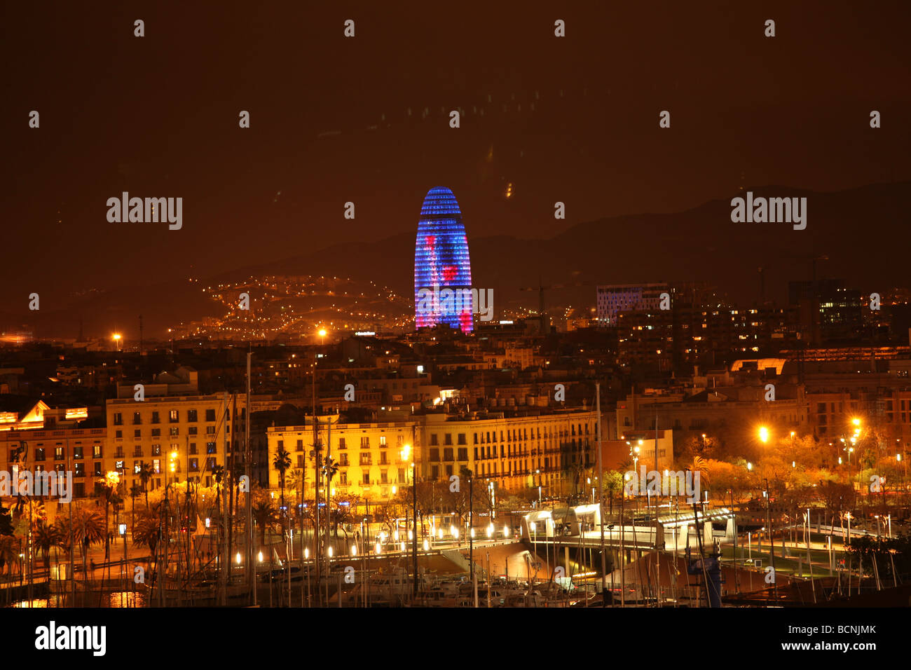 Agbar Tower in Red and Blue at night Stock Photo