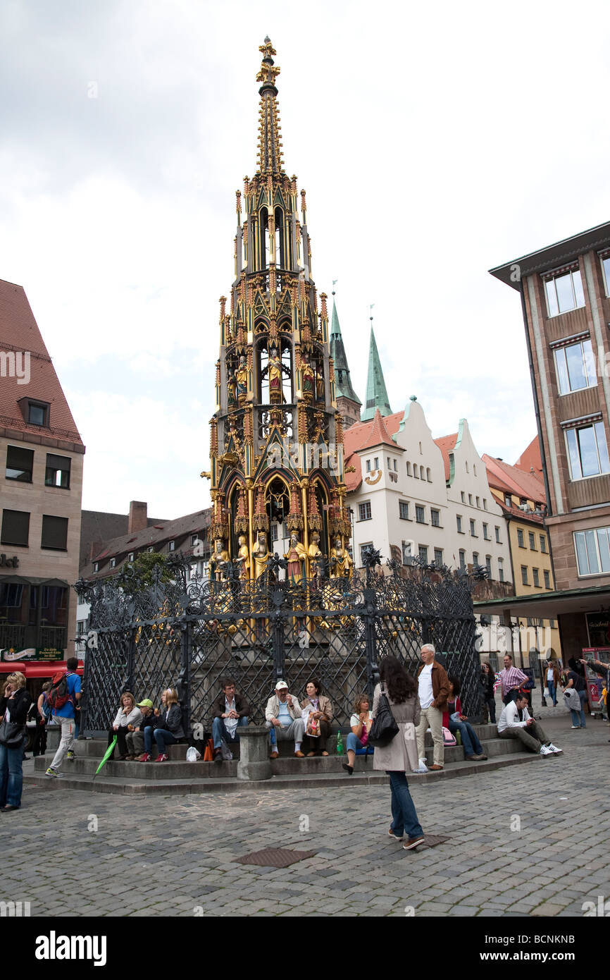 Nuremberg's star attraction is the Gothic Schöner Brunnen (Beautiful Fountain) which was erected around 1385 but subsequently re Stock Photo