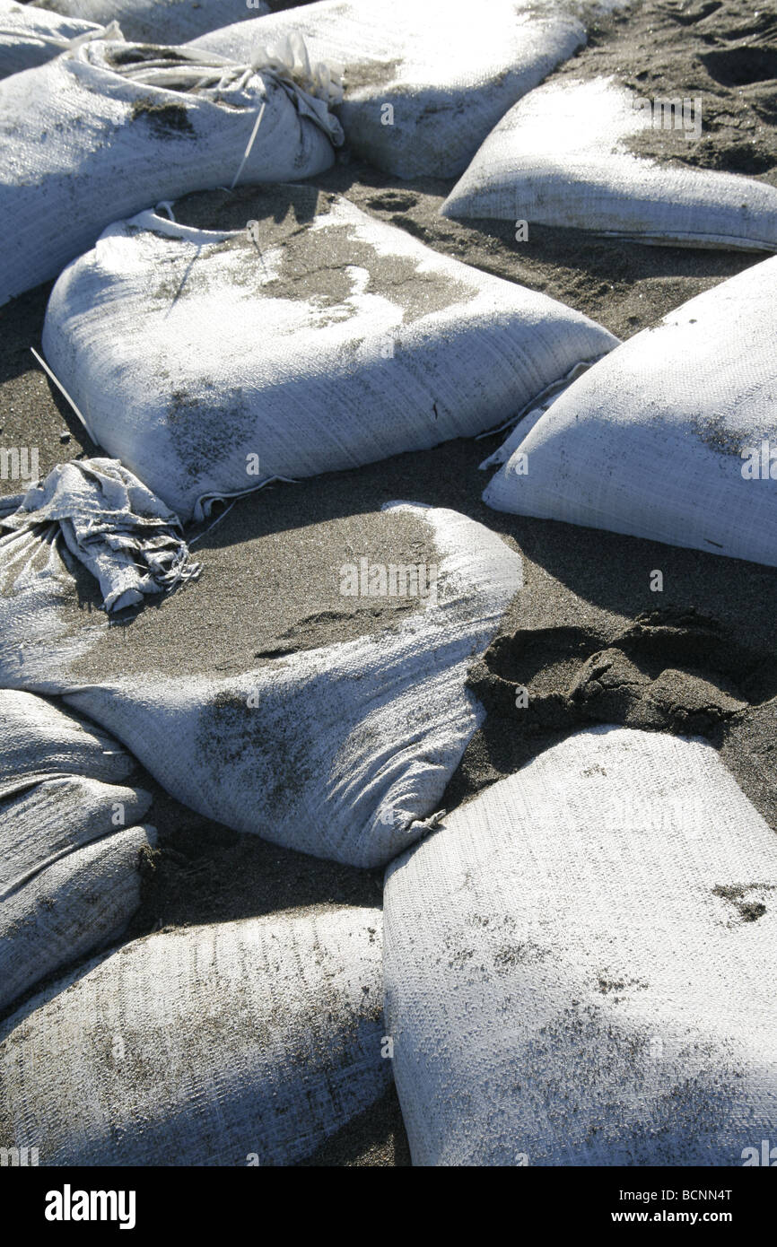 sand bags used as barrier on sea shore Stock Photo Alamy