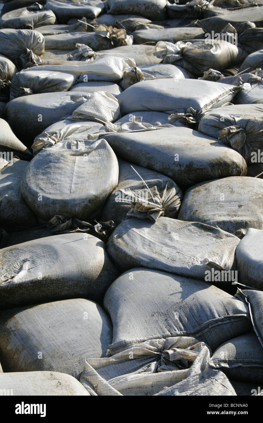 sand bags used as barrier on sea shore Stock Photo Alamy