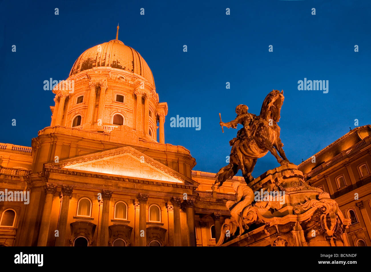 Buda's Royal Palace Museum on Castle Hill with equestrian statue of Prince Eugene of Savoy in Budapest at night Stock Photo