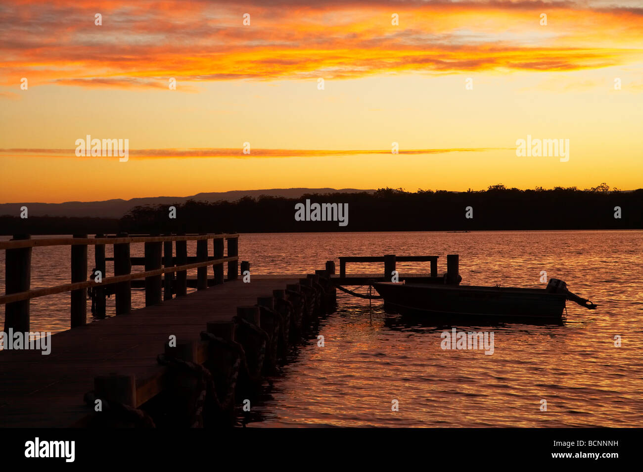 Sunset over Jetty St Georges Basin Shoalhaven New South Wales Australia Stock Photo