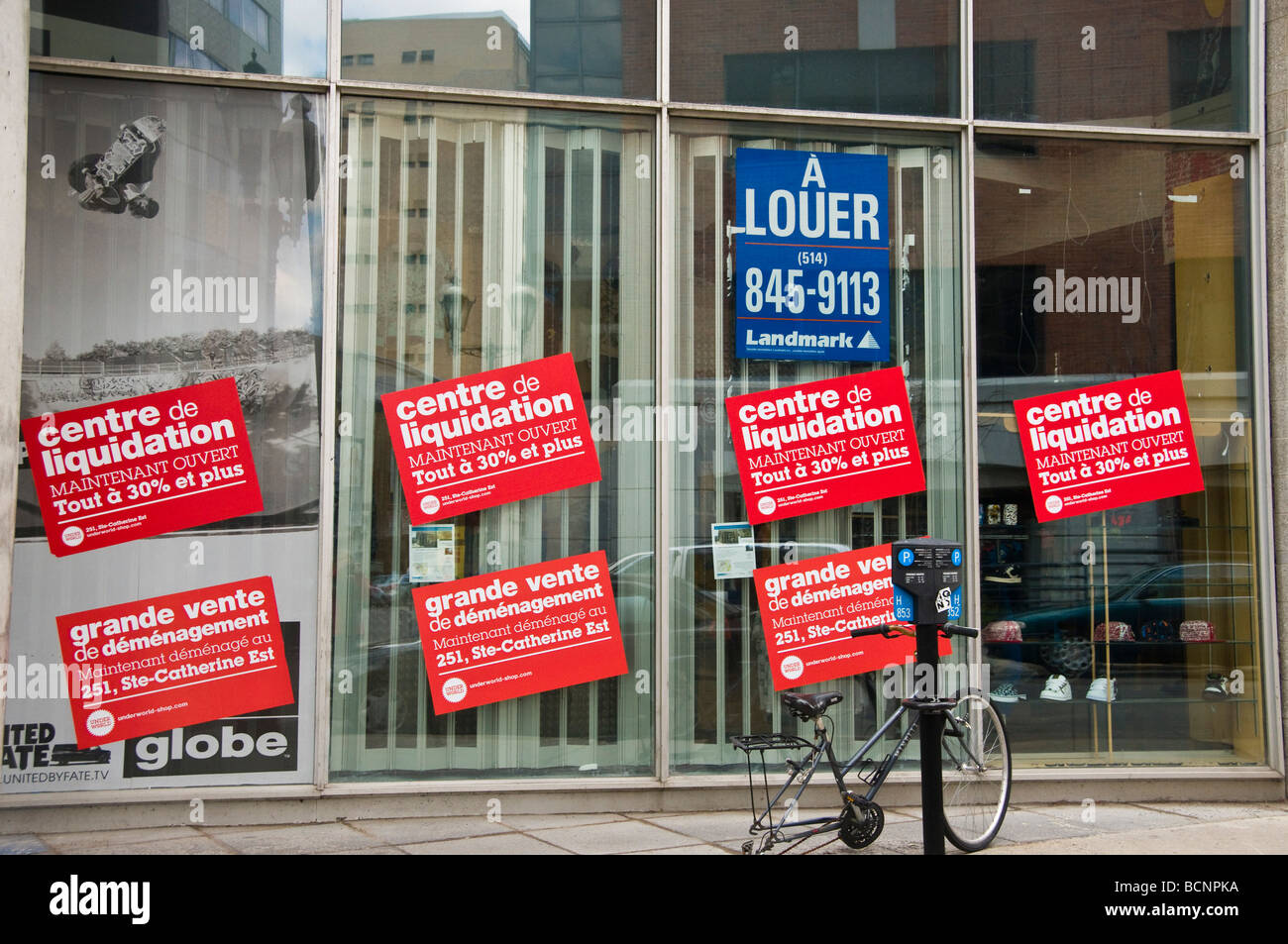 Stores closing and liquidations on Ste Catherie street Montreal Quebec Canada Stock Photo