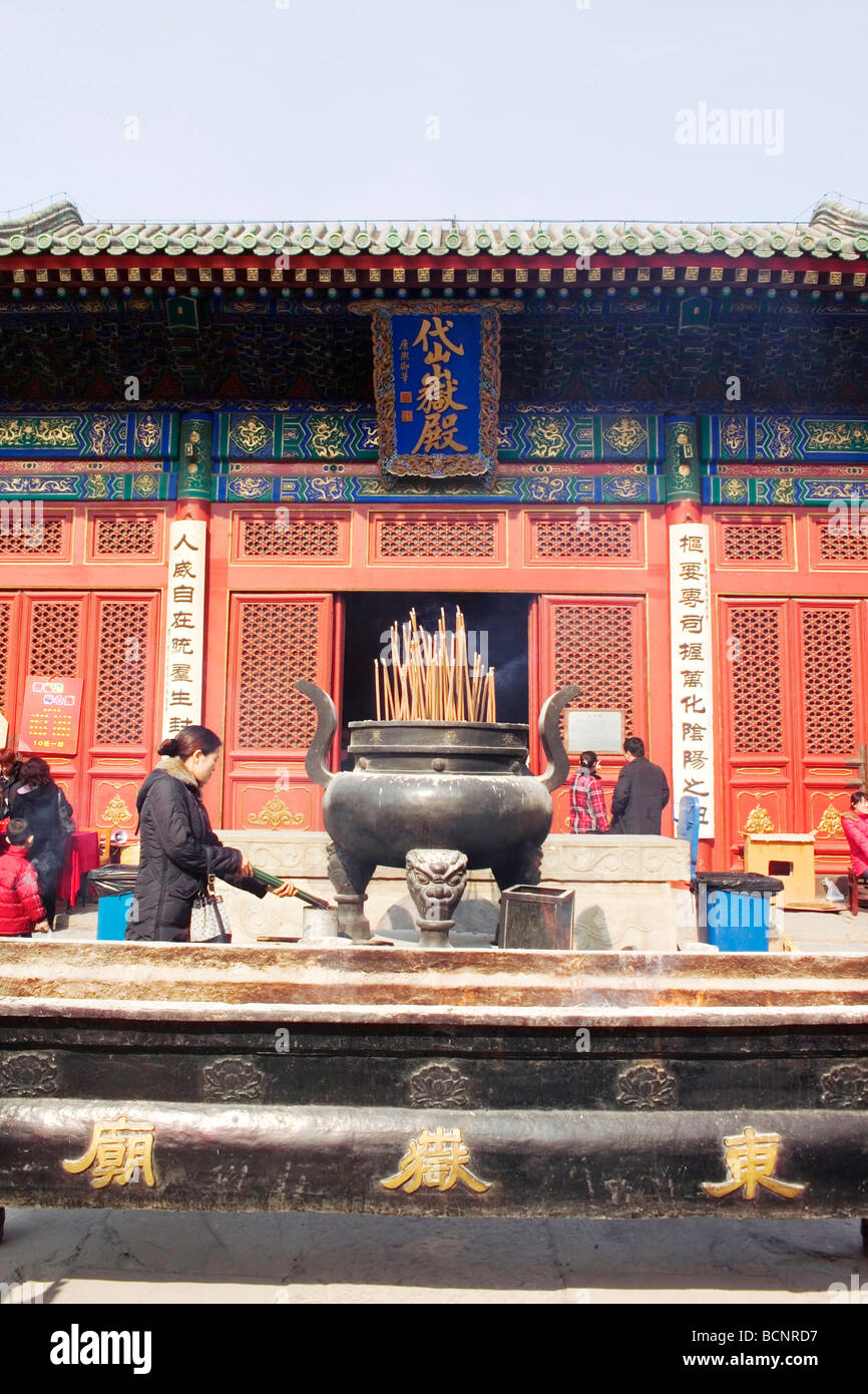 People burning incense in Dongyue Temple for good luck and protection from gods, Dongyue Temple