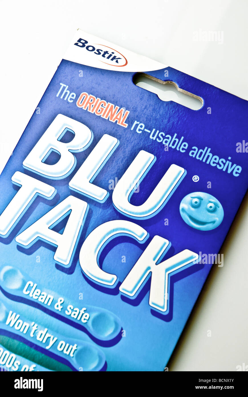 Blu-tack and pins Stock Photo