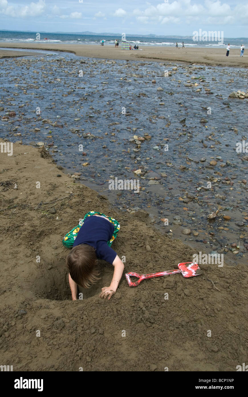 Digging a hole, boy hires stock photography and images Alamy