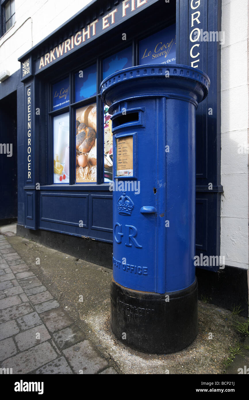 Blue post box in the main street St Anne Alderney Channel Islands UK