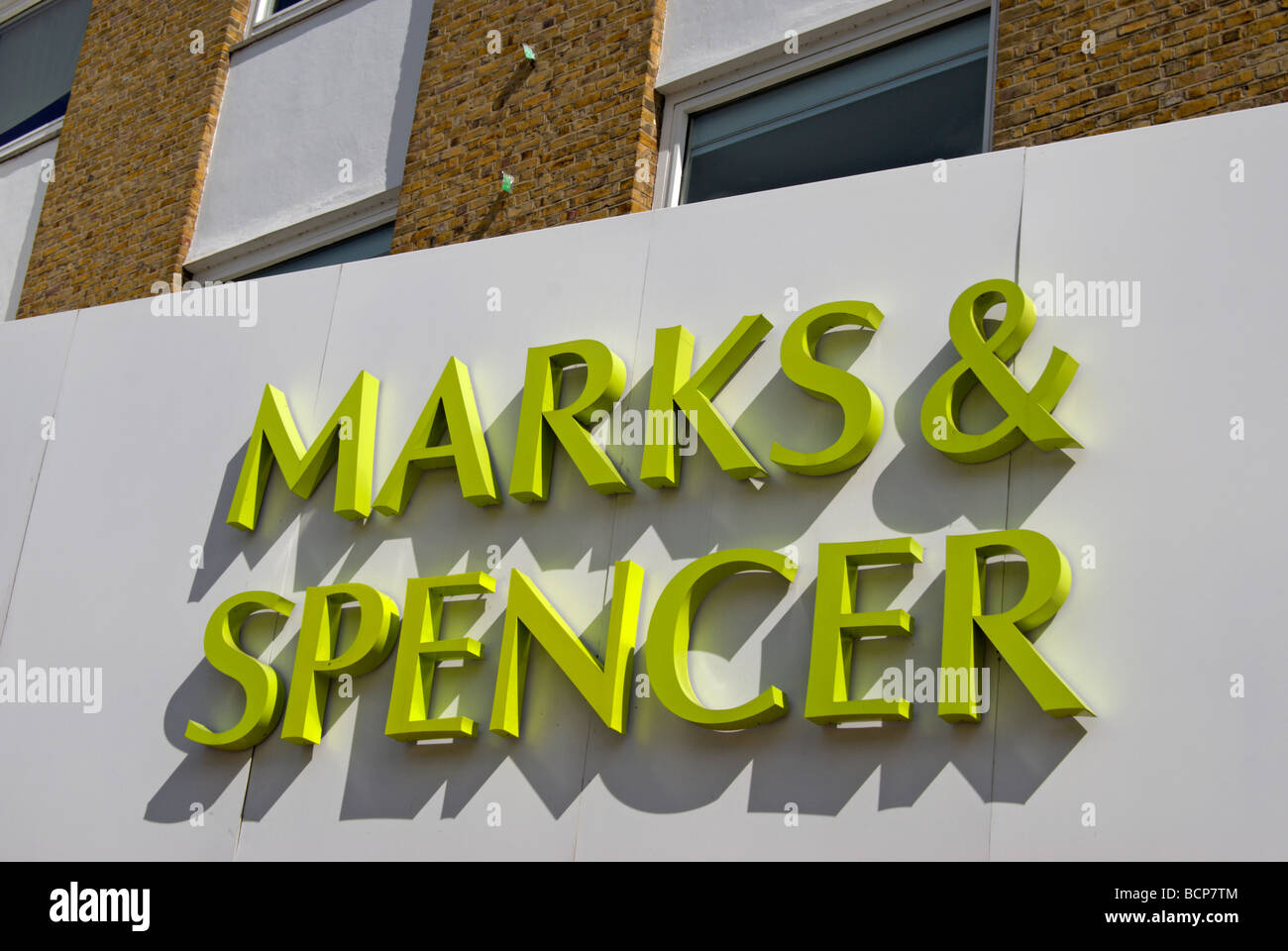 marks and spencer logo above an entrance to the store in kingston upon ...