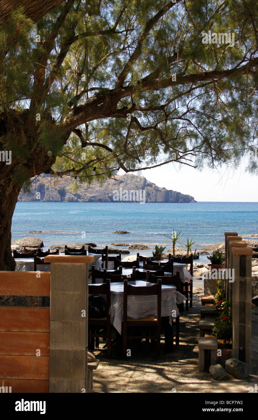 TRADITIONAL GREEK TAVERNA AT PLAKIAS ON THE ISLAND OF CRETE. Stock Photo