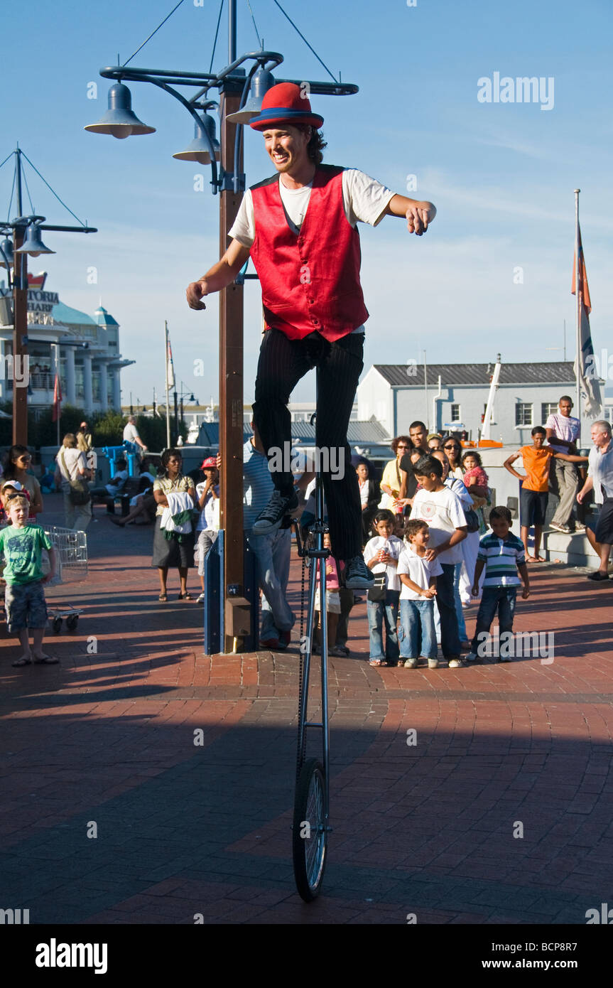 unicycle juggler performing at the Victoria and Alfred Waterfront in