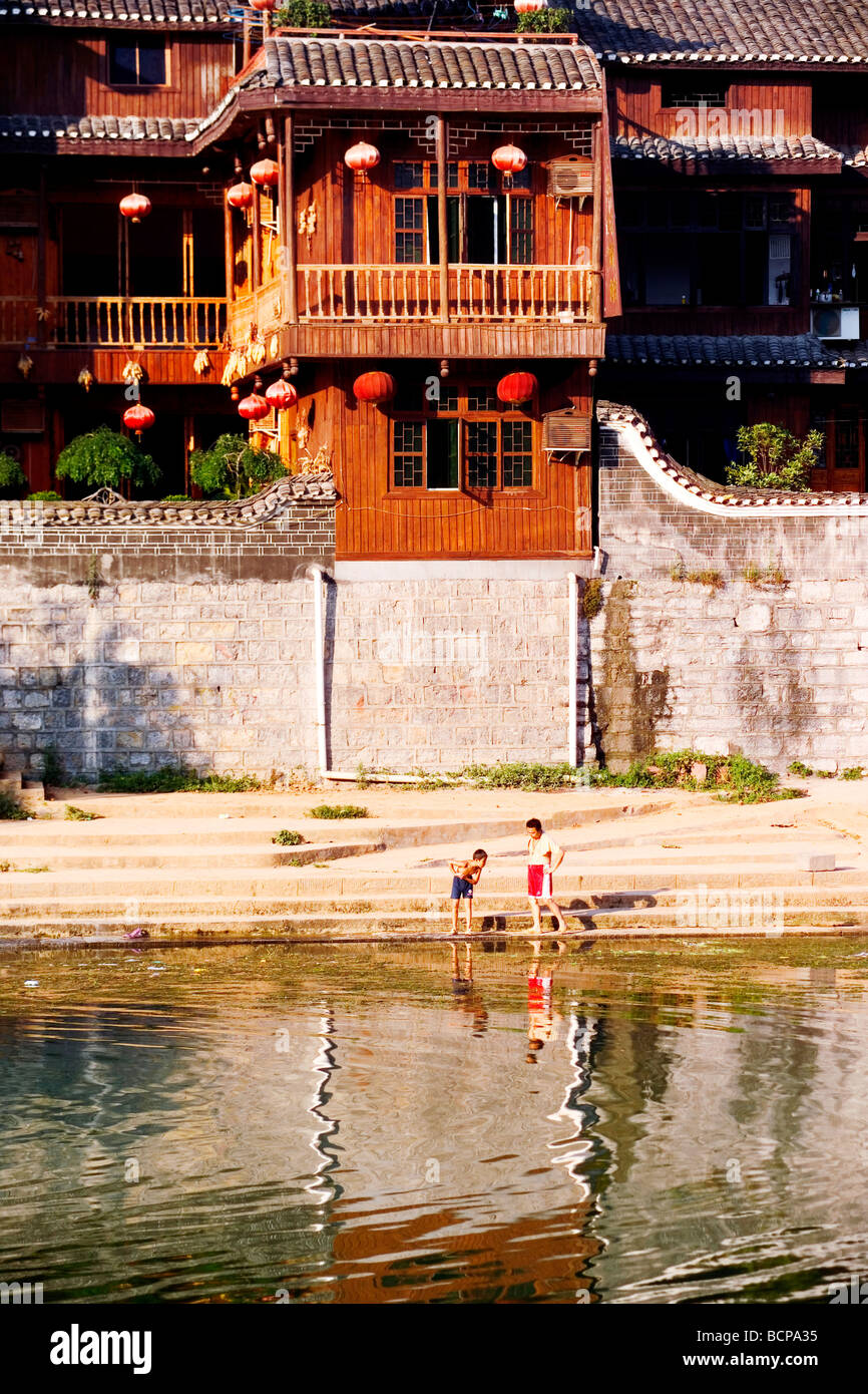 Two boys playing river hi-res stock photography and images - Alamy