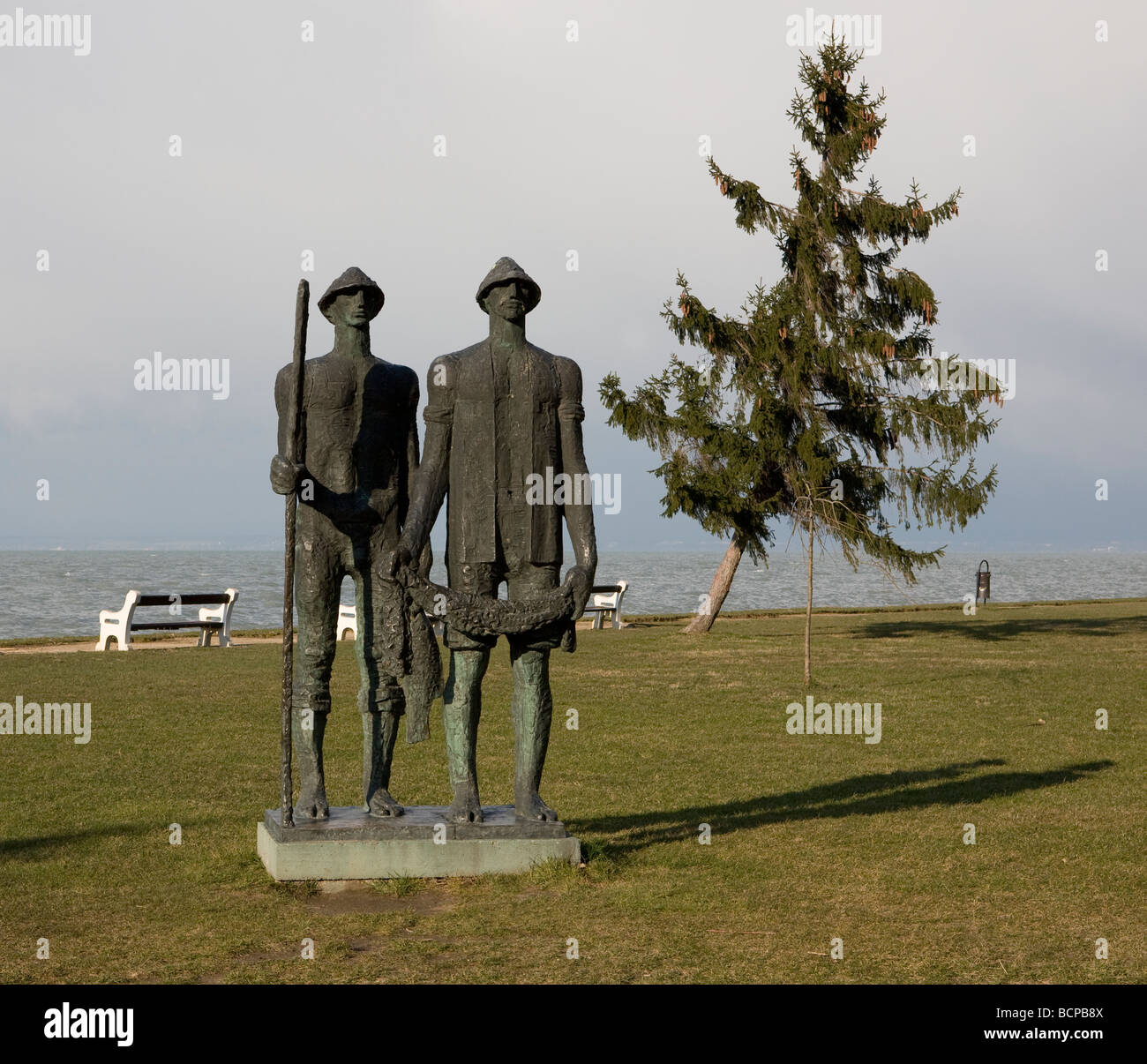 Statue of fishermen on the shore of Lake Balaton in Siofok, Hungary Stock Photo