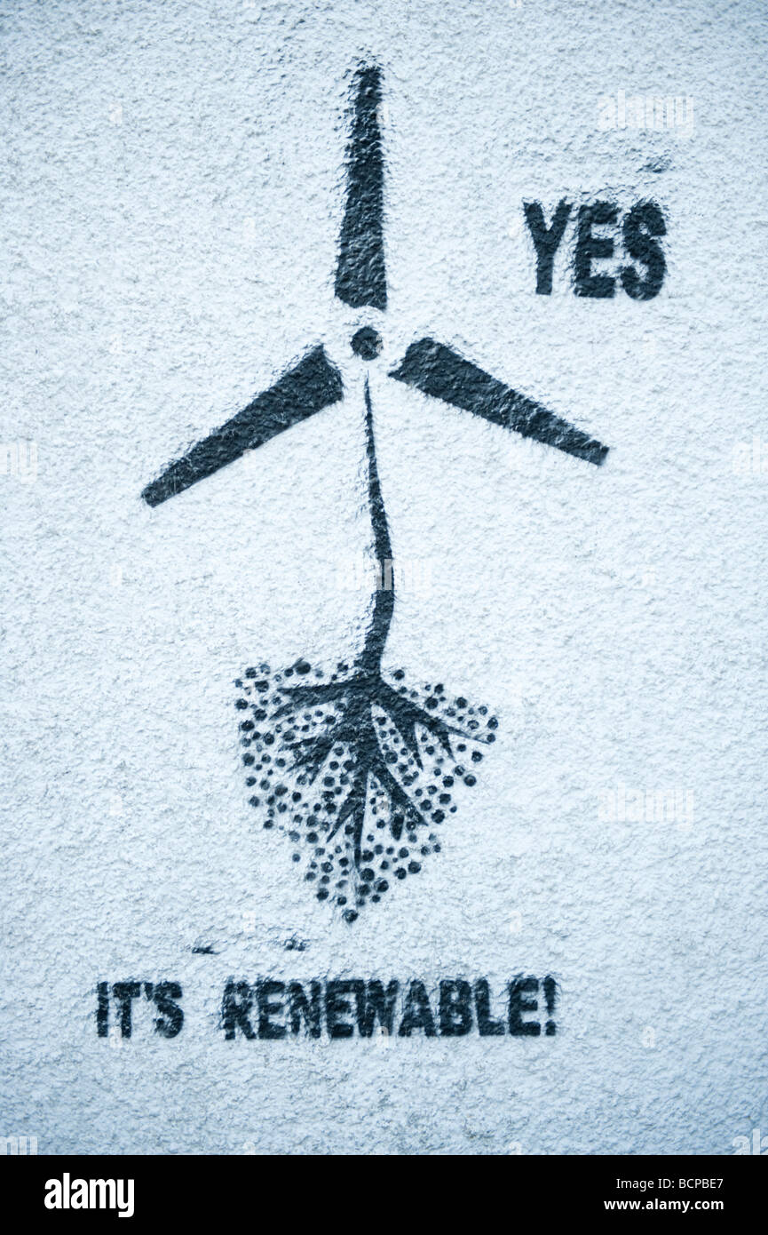 Pro wind farm graffiti stenciled on a wall of a house in the village of New Radnor Powys Mid Wales UK Stock Photo