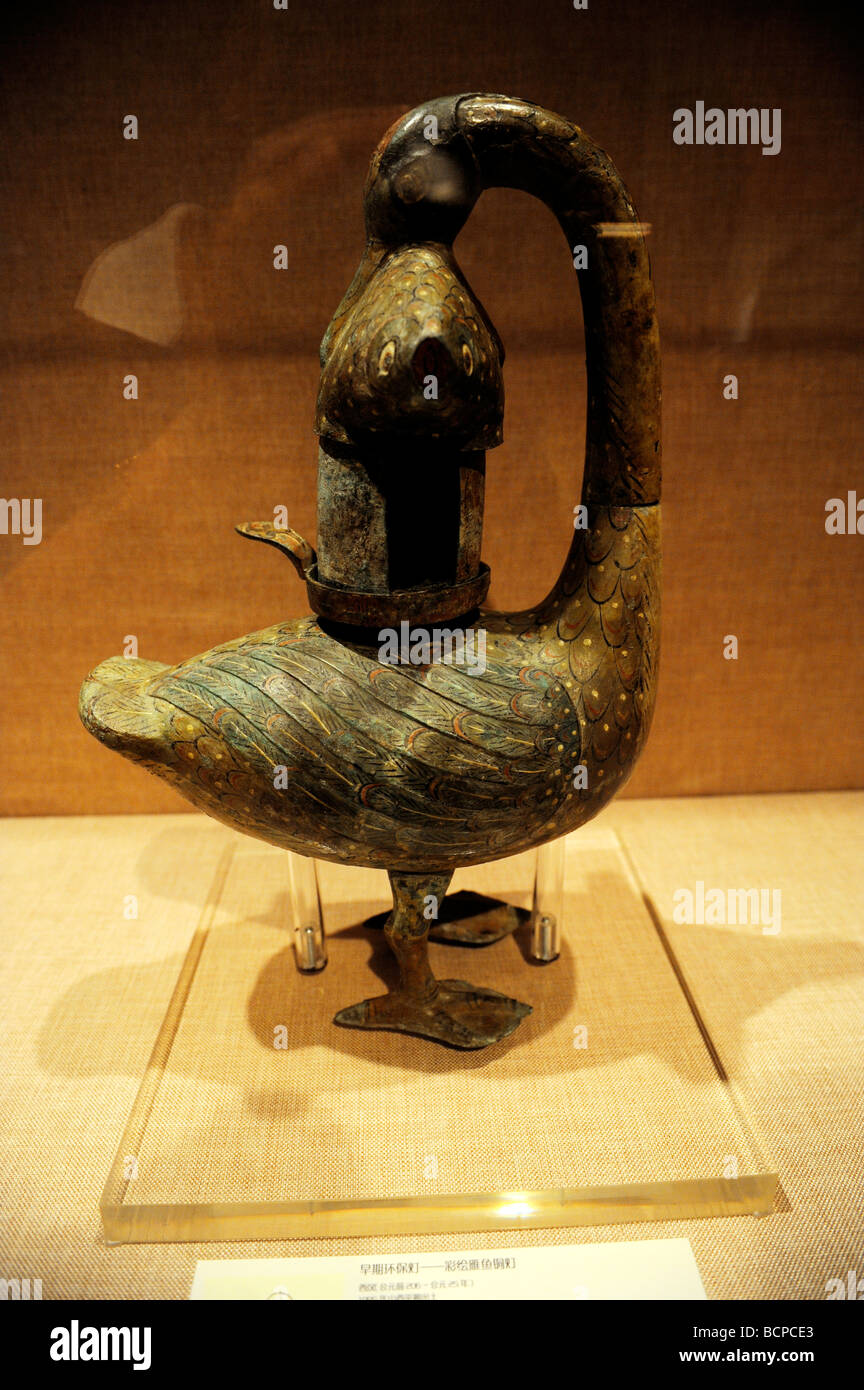 Bronze lamp with wild goose catching a fish from West Han Dynasty, Capital Museum, Beijing, China Stock Photo