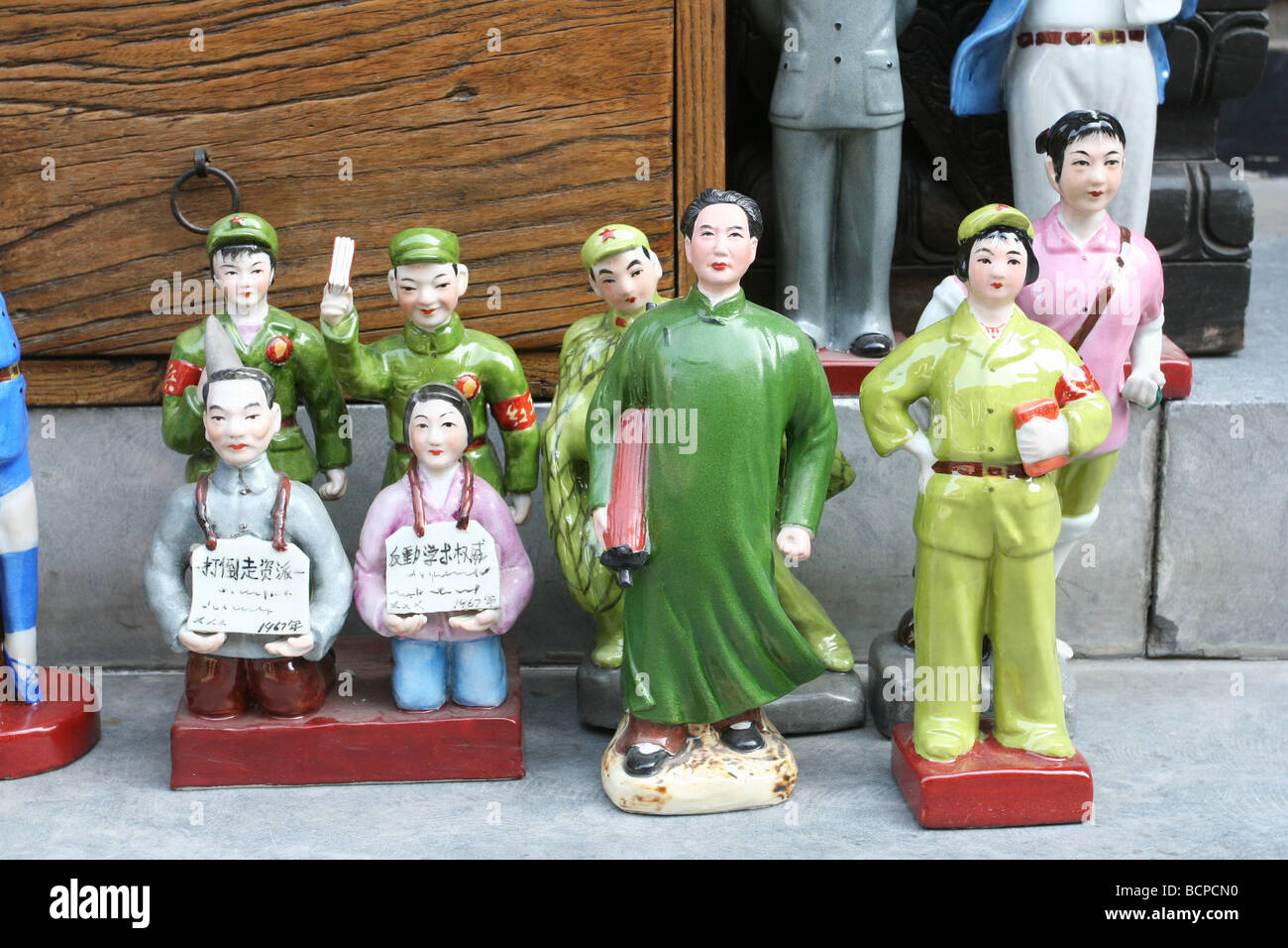 Clay statue depicting characters from Culture Revolution erra, Panjiayuan Antique Market, Beijing, China Stock Photo