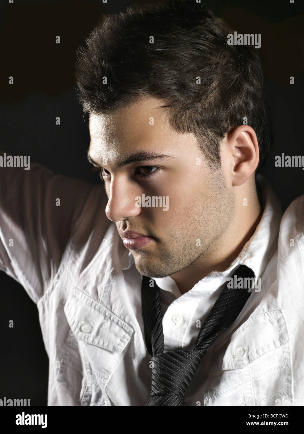 Man in white shirt black hi-res stock photography and images - Alamy