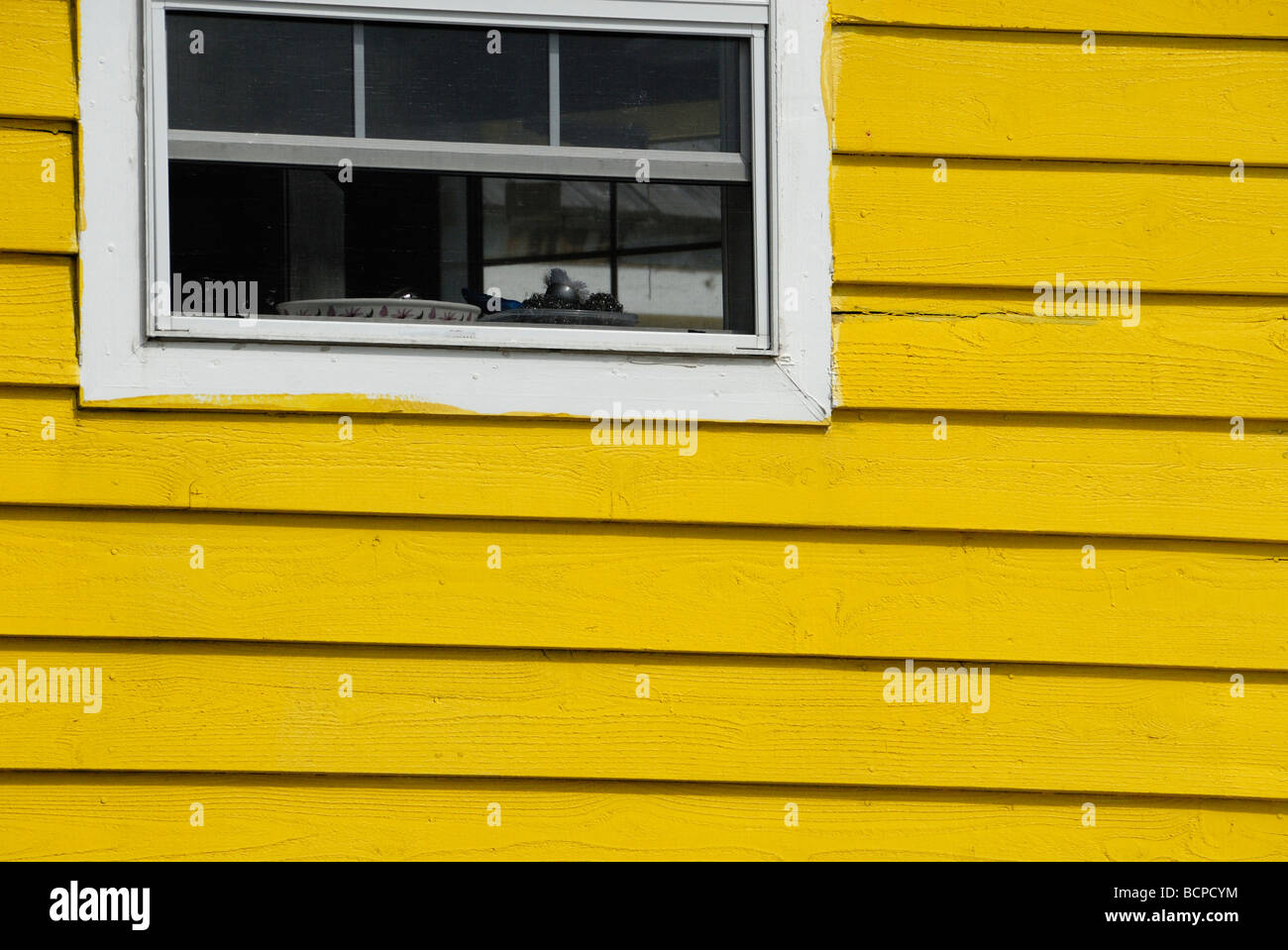Plates by an open window on a beach house Pensacola Florida USA Stock Photo