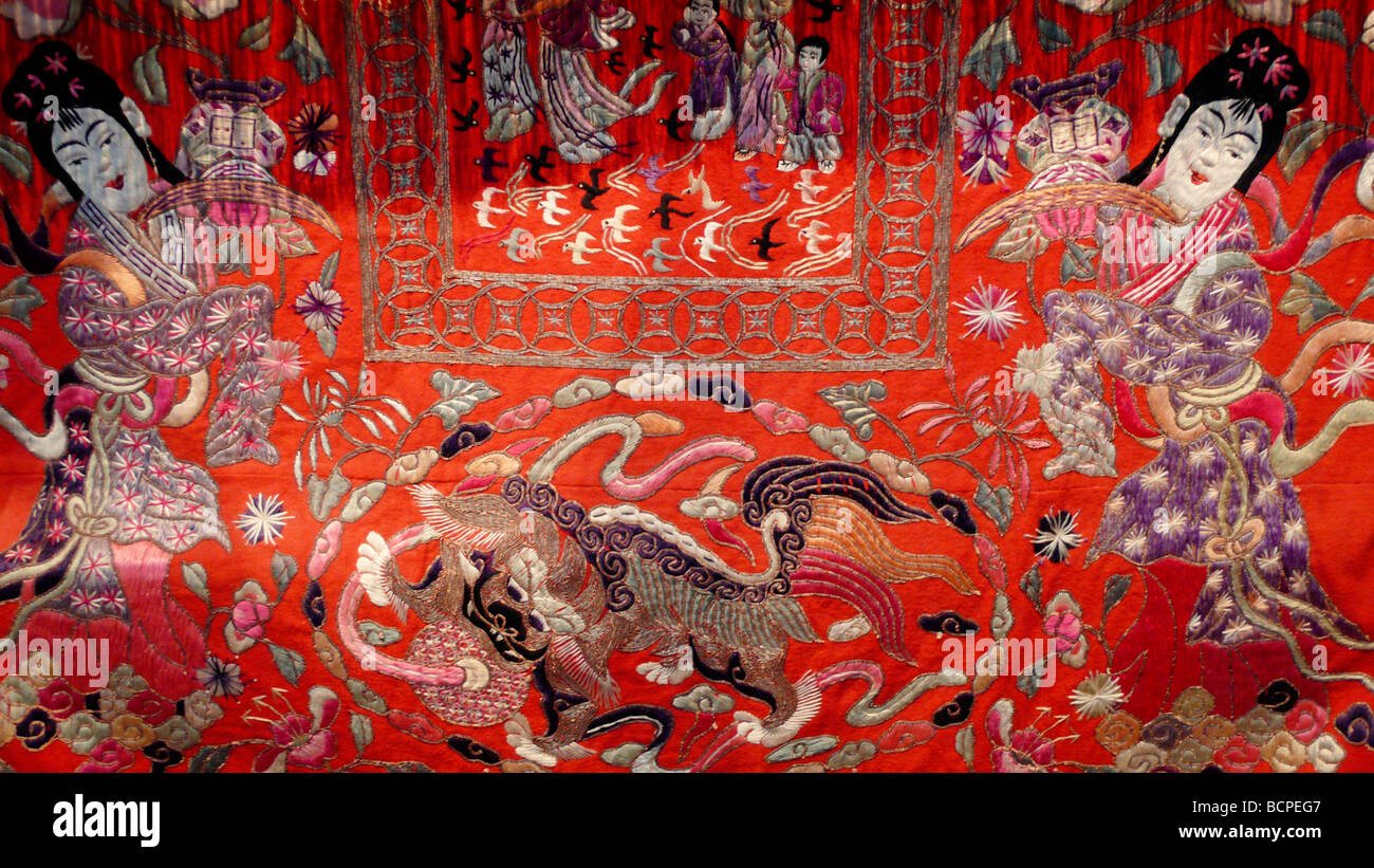 Details of embroidery on the fabric of a wedding sedan chair, Capital Museum, Beijing, China Stock Photo