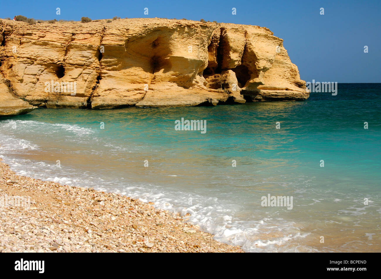 Rocky cliff line at the Gulf of Oman, Sultanate of Oman Stock Photo