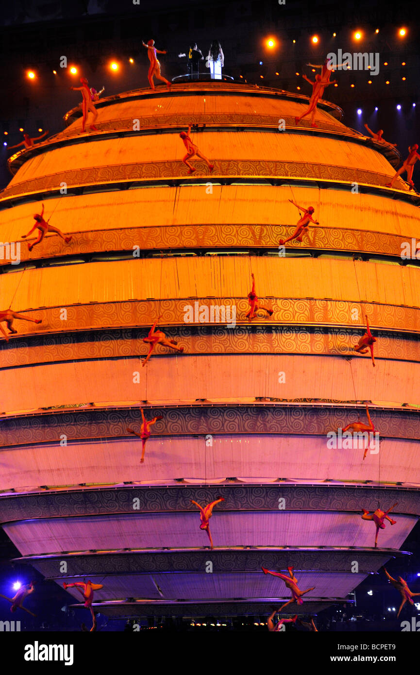Dancing on giant illuminating globe hi-res stock photography and images 