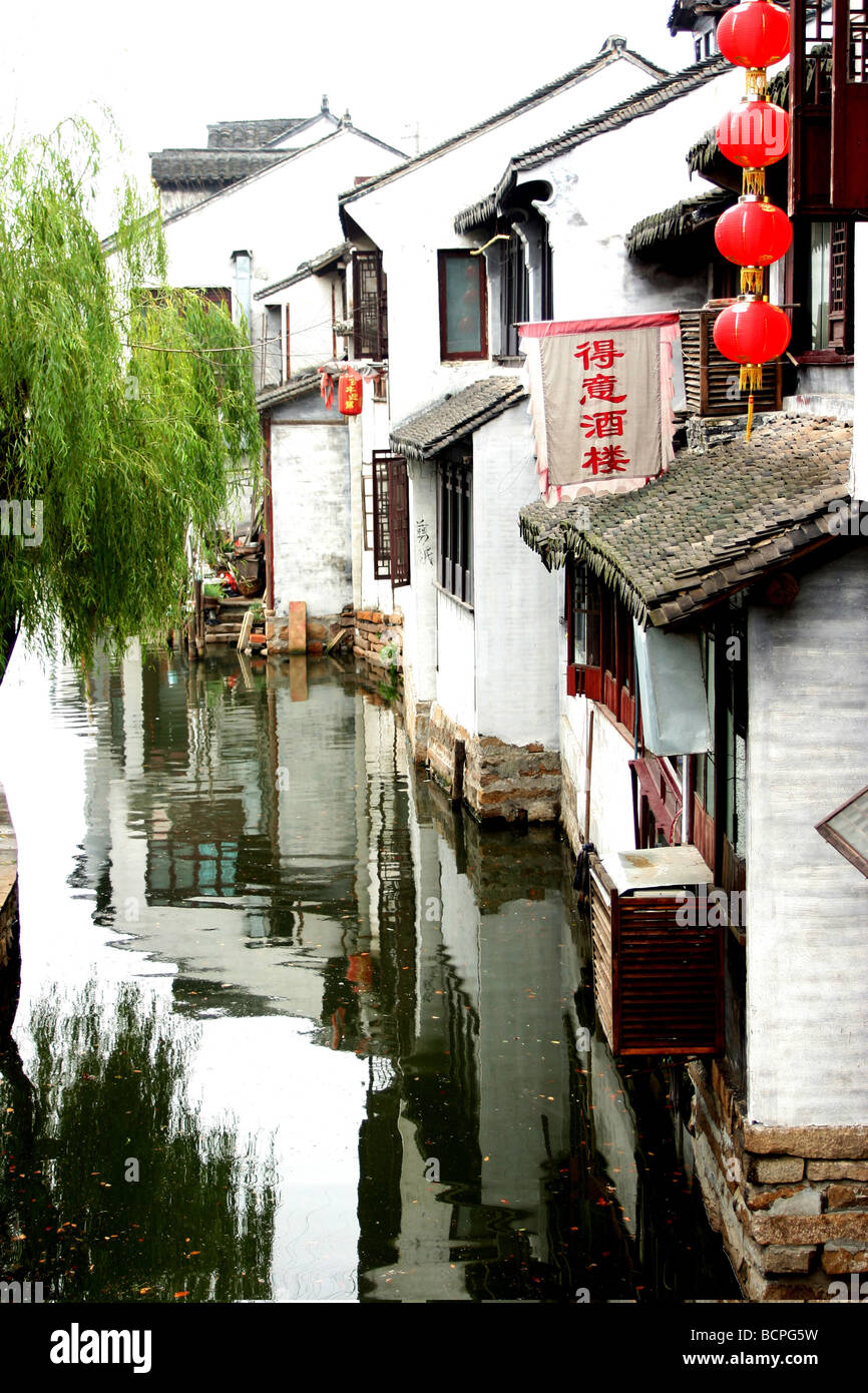 Narrow waterway and traditional riverside residence, Xitang Water Town ...