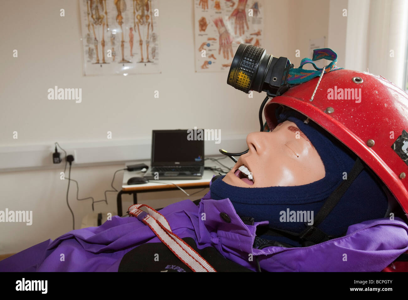 A sim man being used in a training scenario for mountain rescue volunteers Sim Man is a highly technical medical dummy Stock Photo