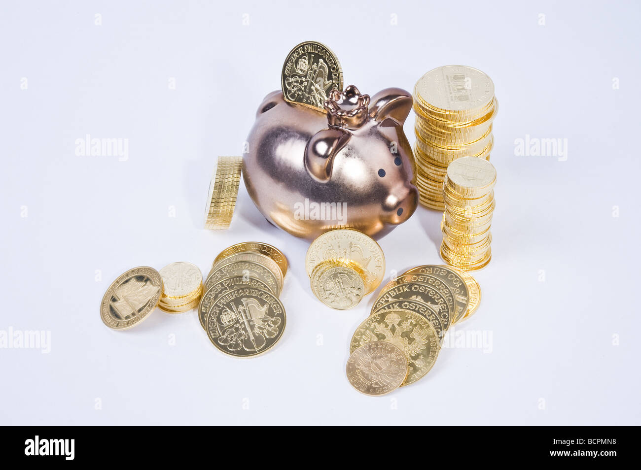 Sparschwein mit Goldmünzen Piggybank and Gold Coins Stock Photo