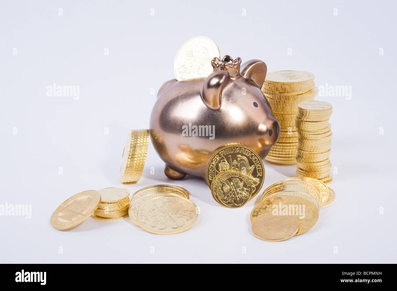 Sparschwein mit Goldmünzen Piggybank and Gold Coins Stock Photo