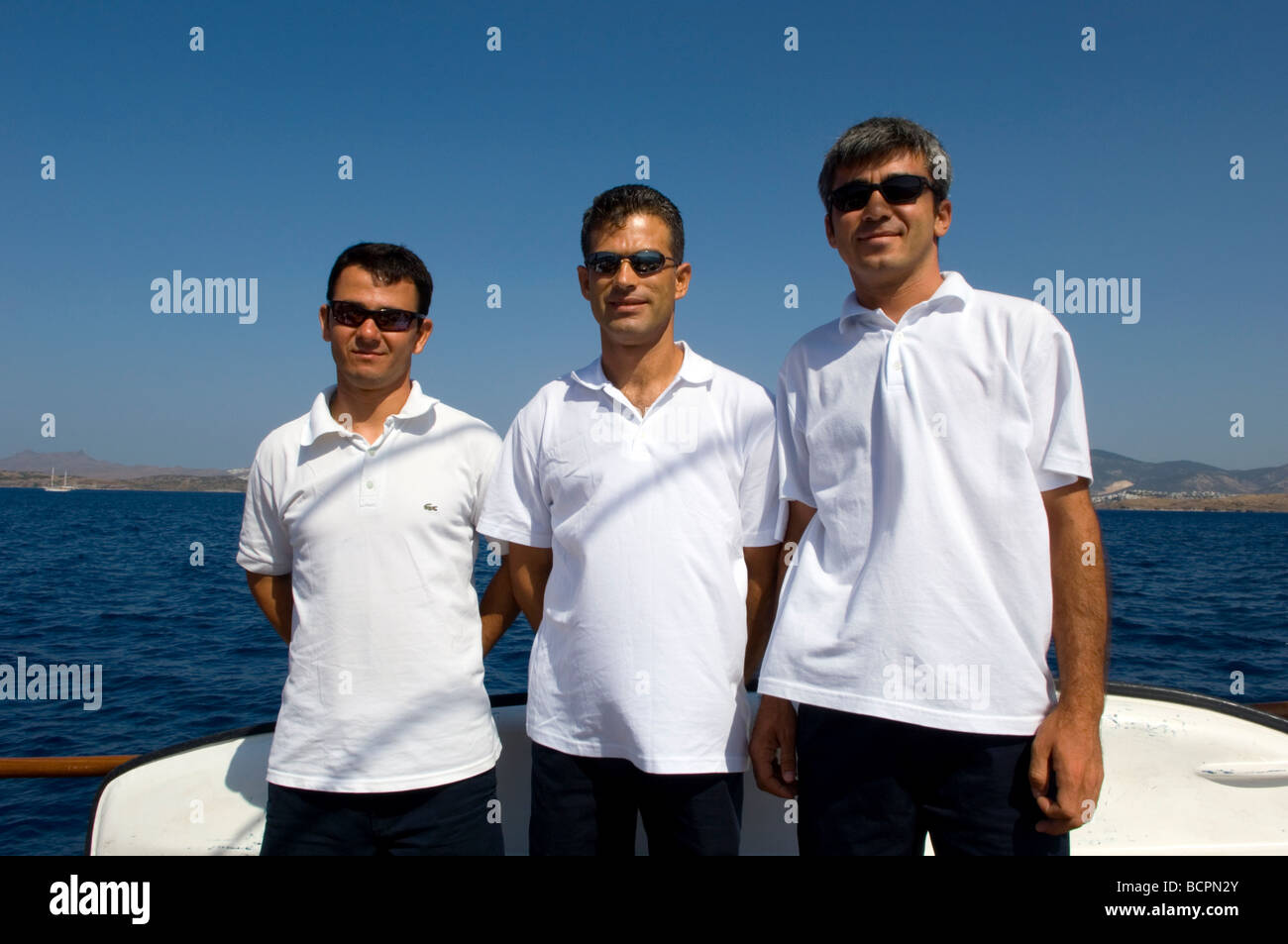 Crew members of a touring boat Stock Photo