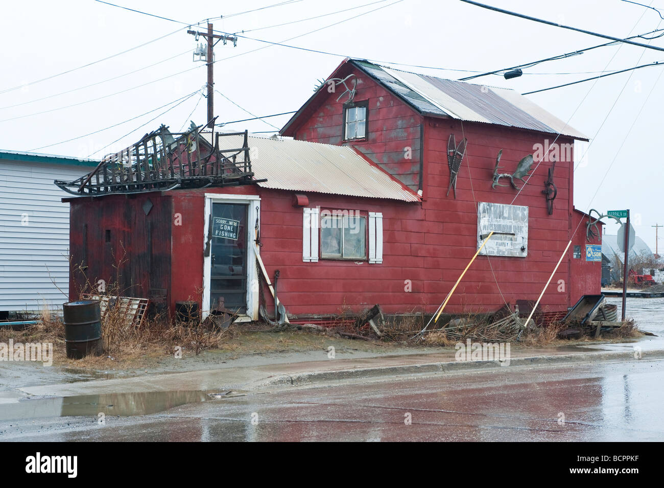 ANTLERS DECORATE THE SIDES OF AN OLD STORE IN NOME ALASKA Stock Photo