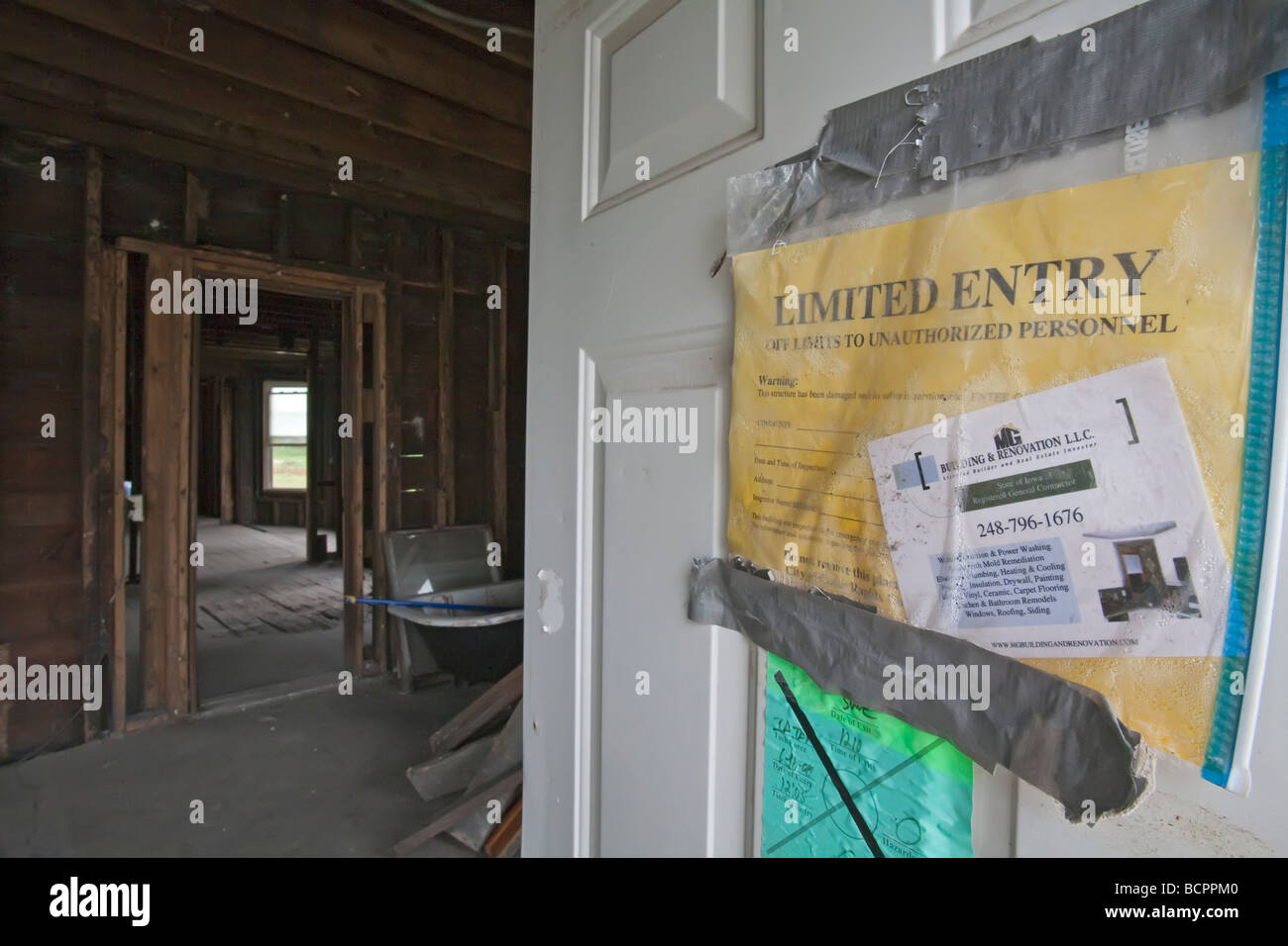 Sign warns against entering house damaged in Cedar Rapids flood Stock Photo