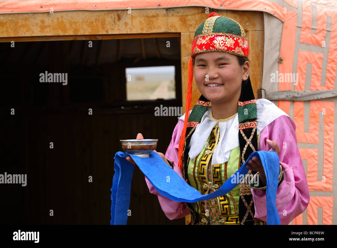 Young girl welcoming visitors at a tourist ger camp, Mongolia Stock ...