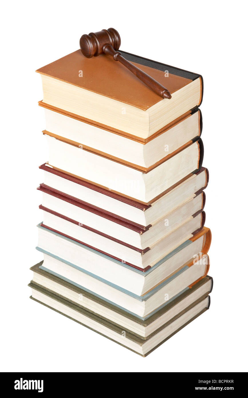 Wooden gavel from the court and law books isolated on white background