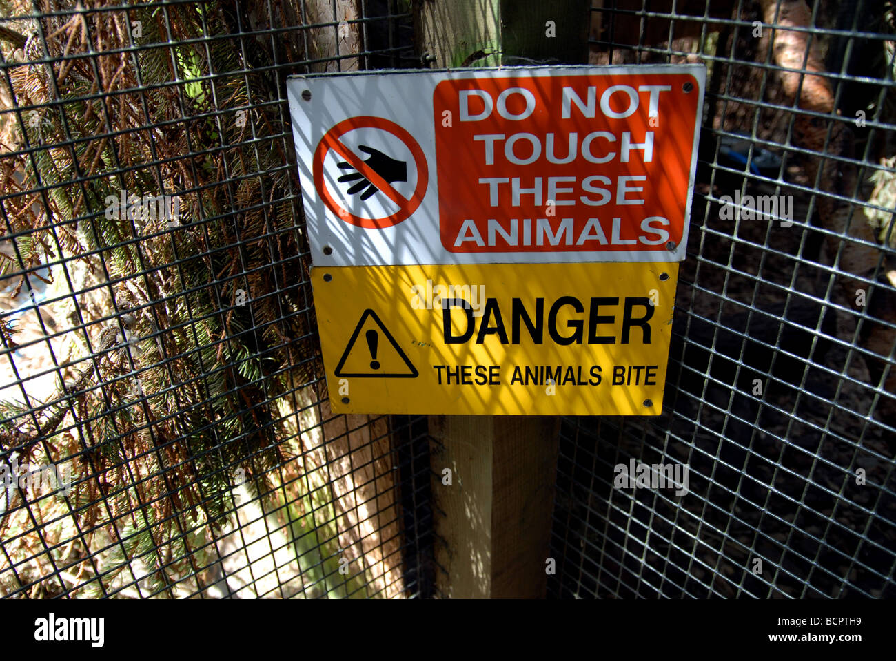 Danger DO NOT TOUCH animals sign Stock Photo