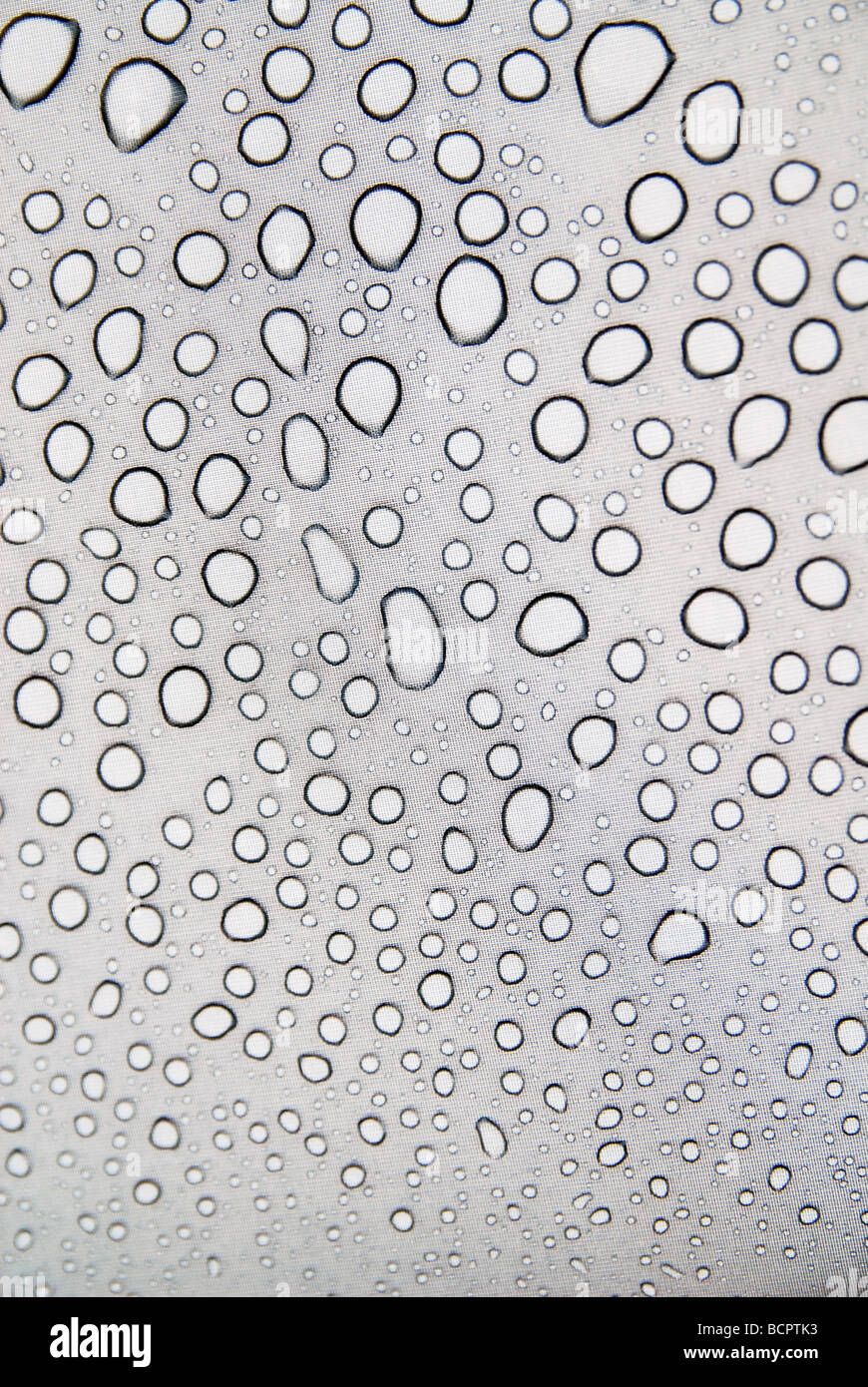 Rain drops on canvas fabric Stock Photo