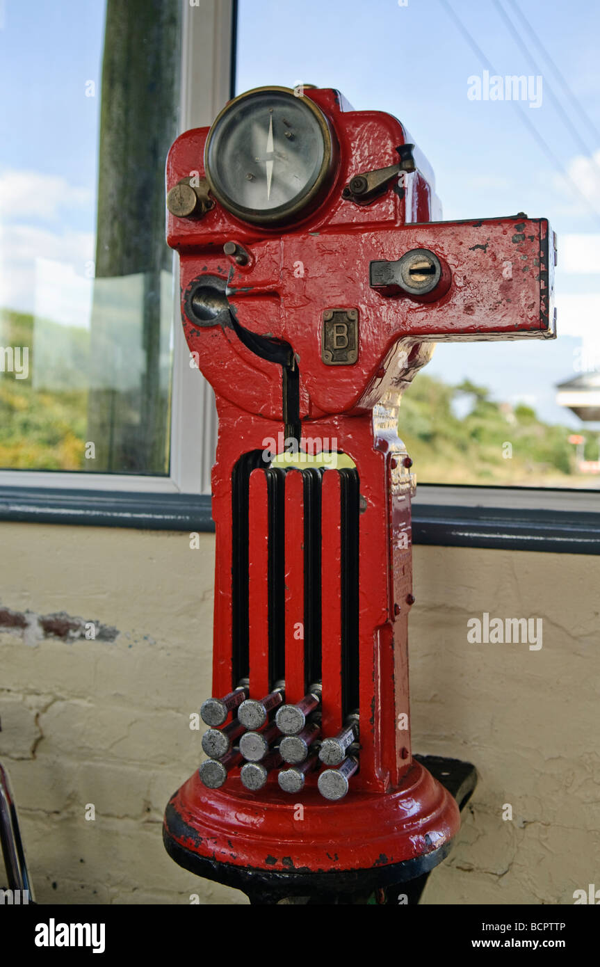 Electric train ticket apparatus in a signal box, used to avoid collisions on a single track line. Stock Photo