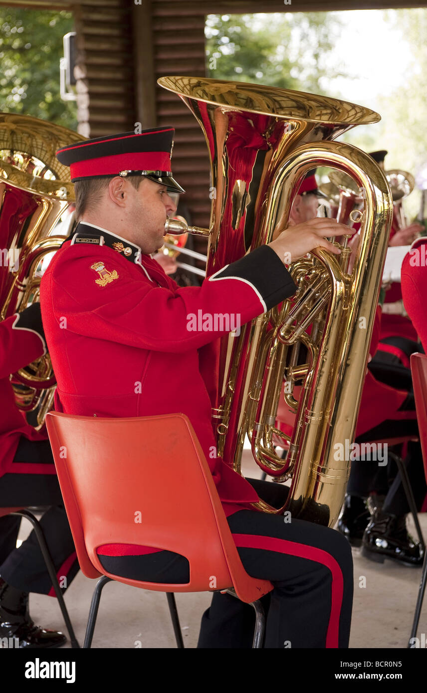 Fully uniformed Royal Welsh Regimental Band tuba player during a