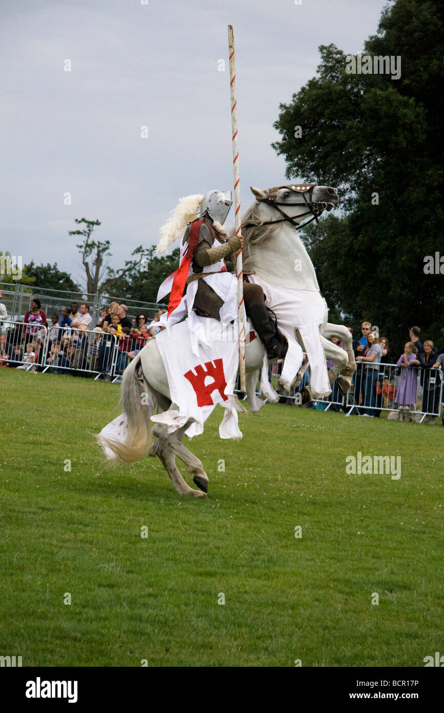 A medieval jousting knight on a rearing up horse, Lambeth Country Show, London, England, UK. 18th July 2009 Stock Photo