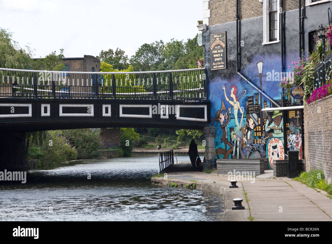 Exterior of The Constitution pub, bridge over St Pancras Way, and Regents Canal. Camden, London, England, UK Stock Photo
