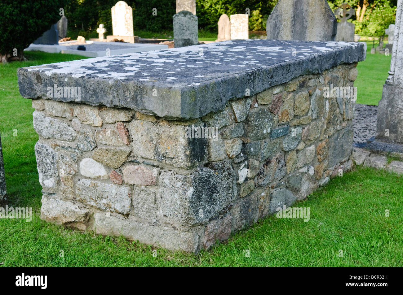 Grave of Thomas Broaders, an Irish Priest said to have carried out many exorcisms in the mid to late 18th Century Stock Photo