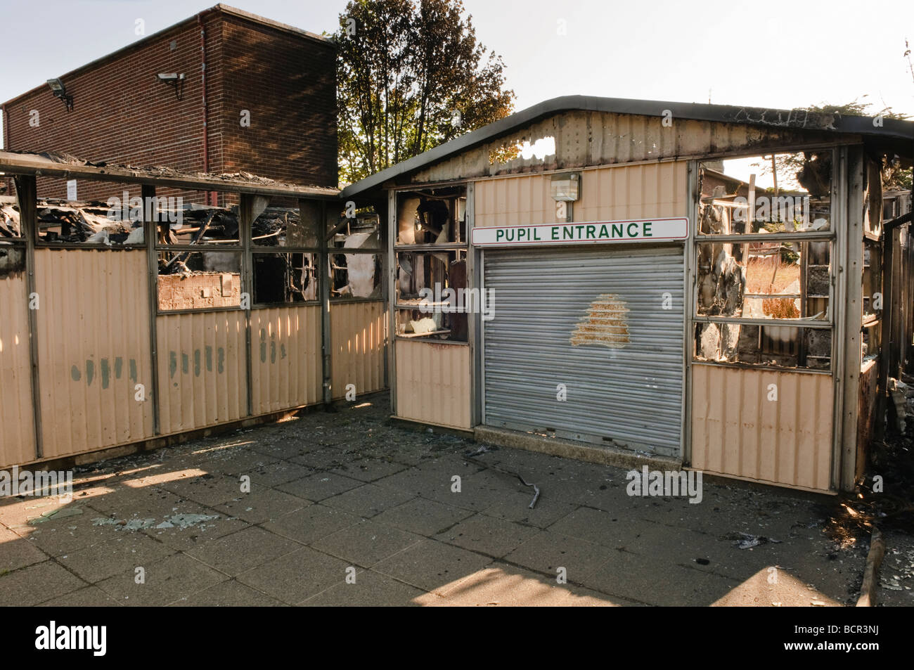 Entrance of a primary school destroyed by arsonists, 18th July 2009. Stock Photo