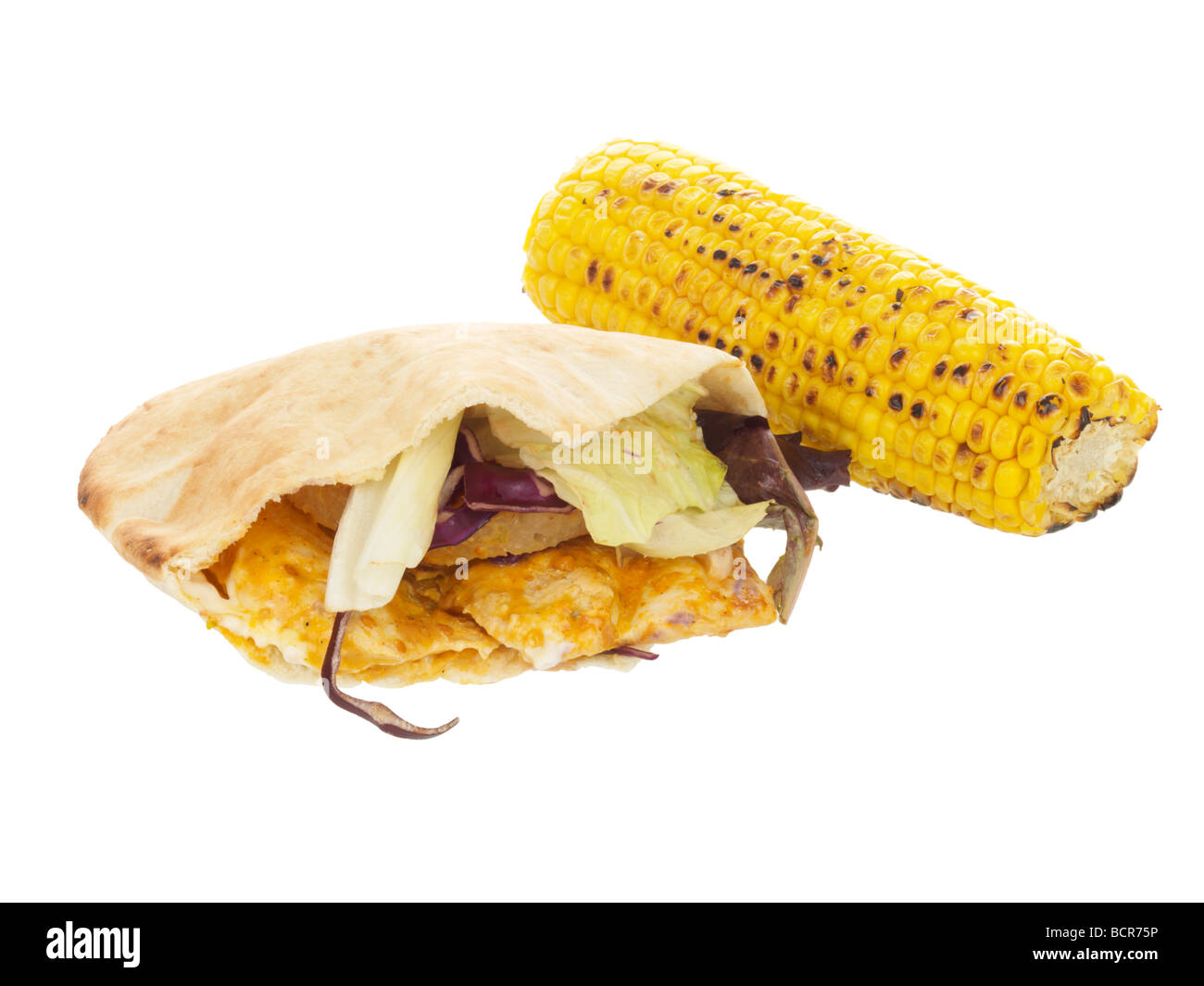 Chicken Pitta with Corn on the Cob Stock Photo