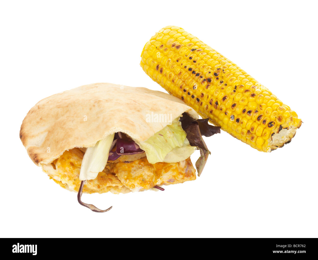 Chicken Pitta with Corn on the Cob Stock Photo