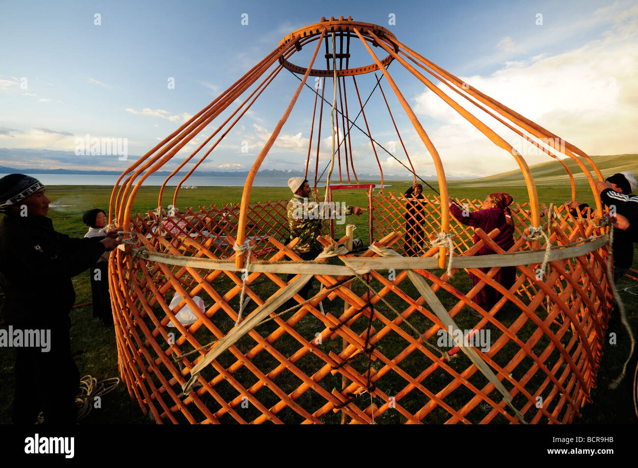 Kyrzgyz nomads building a yurt for the summer at Lake Song Kul Stock Photo